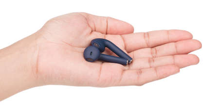Hand holding Blue headphones airpods isolated on a white background.