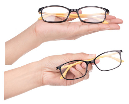 Collection hand holding Eyeglasses isolated on a white background.の写真素材