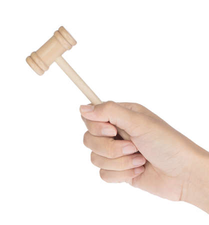 Hand holding Wooden Hammer Toy Isolated on white Background.の写真素材