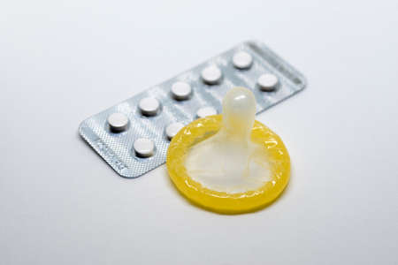 Condom and pills