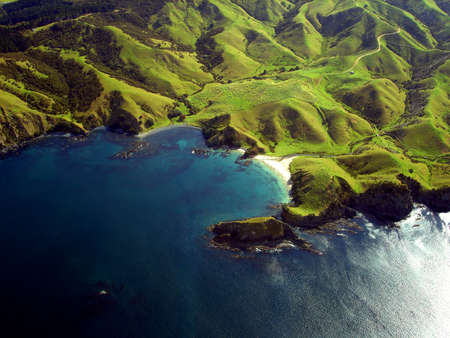 Wrinkled Green Appearance of Hills and Mountains along the coastline of Northland, New Zealand                の写真素材