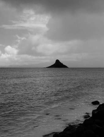 Incoming Storm over Mokolii Island (Chinaman's Hat), Oahu, Hawaiiの写真素材