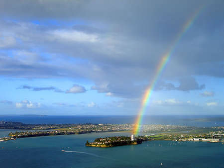 Rainbow over Stanley Bay, Auckland, New Zealandの写真素材