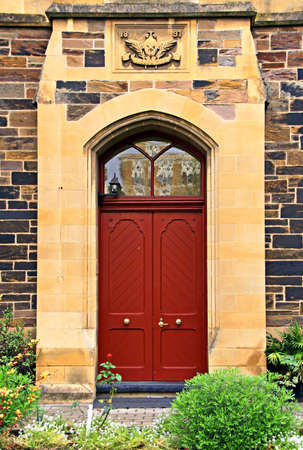 Red Doors to a restored Historic Building originally built in 1891. Adelaide, Australiaの写真素材