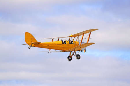 1942 Yellow DH82 Tiger Moth Bi-plane. Gipsy Major - Four cylinder inline engine.の写真素材