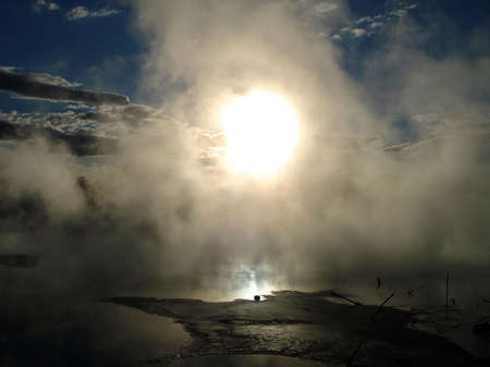 Setting Sun through Geothermal Mists. Kuirau Park, Rotorua, New Zealandの写真素材
