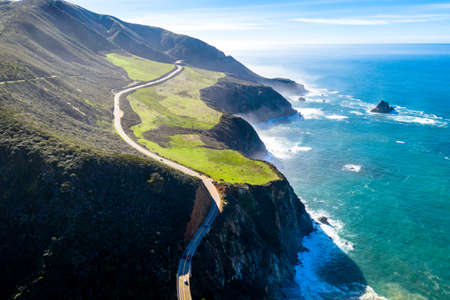 Aerial View Drone Shot of Highway Pacific Coast Highway California USA Big Sur Mountains Ocean Fogの写真素材