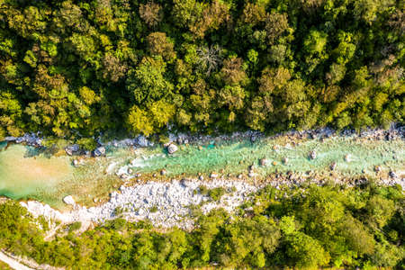 Beautiful Soca River in Slovenia europe. Aerial Shot of the Valley. Mountains, River, Forest.