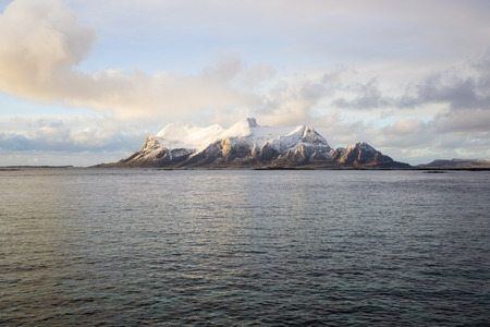 View of a Norwegian fjord with snowy mountains, Nordland, Norwayの写真素材