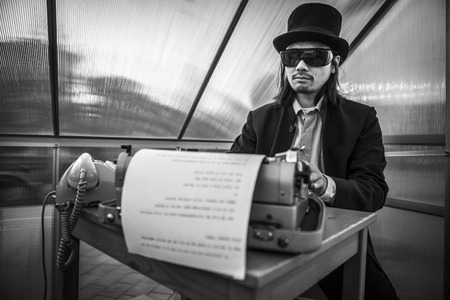 Amsterdam, The Netherlands, 12-14 Septembre 2014, during Westival, an open air free Cinema and culture festival on Mercatorplein - artistic installation, man typewritingのeditorial素材