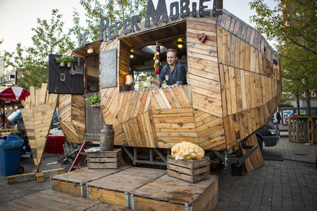 Amsterdam, The Netherlands, 12-14 September 2014, at Westival, a free open air Cinema and culture festival on Mercatorplein. people hanging around , having a snack before the opening ceremony and the screeningのeditorial素材