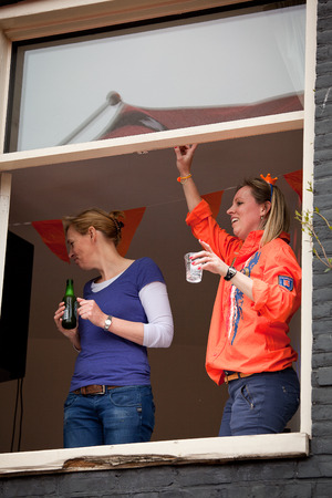 Amsterdam, The Netherlands, April 30, 2014: celebration of the public national holiday Kings day - Koningsdag - held every year on 30th of April in the entire country to celebrate the birthday of King Willemのeditorial素材