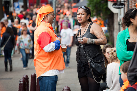 Amsterdam, The Netherlands, April 30, 2014: celebration of the public national holiday Kings day - Koningsdag - held every year on 30th of April in the entire country to celebrate the birthday of King Willemのeditorial素材