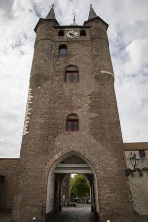 Old city gate built with red bricks, Zuidhavenpoort,  Zierikzee, Netherlandsの写真素材