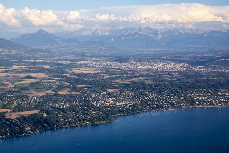 Aerial view over the mountain range of the Alps and Geneva lake, Switzerlandの写真素材