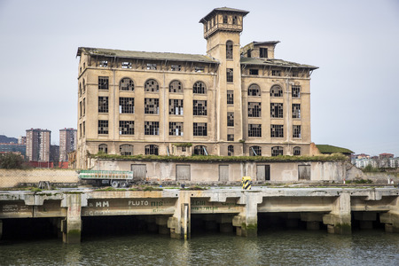 nervion river, at the entrance to Bilbao, crossing Erandio and Sestao villages in an industrial areaの写真素材