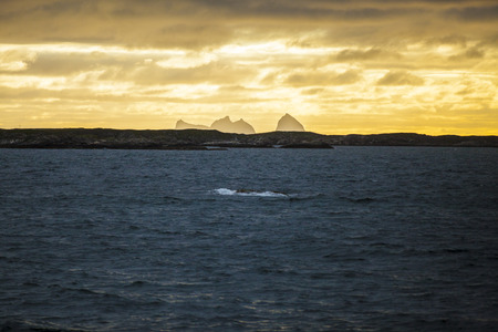 Norwegian landscape, view of the Traena and Sana islands under midnight sun, Norwayの写真素材
