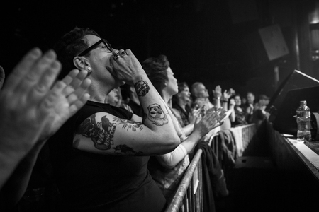 Amsterdam, The Netherlands - 20 february, 2016: audience of fans clapping at concert of Belgian rock singer Arno for his album release Human Incognito at venue Melkwegのeditorial素材