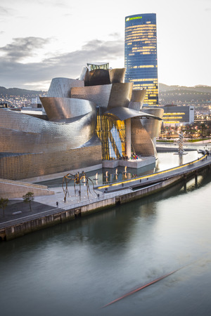 Bilbao, Spain - January 29, 2016: evening view of modern and contemporary art Guggenheim Museum, designed by American architect Frank Gehry and inaugurated in October 1997.のeditorial素材