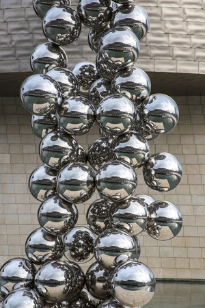 BILBAO, SPAIN - MARCH 19, 2014: Sculpture "The Big Tree" consisting of 80 stainless steel balls with reflections by Anish Kapoor in front of The Guggenheim Museum in Bilbao, Basque Country, Spainのeditorial素材