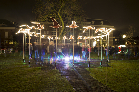 Amsterdam, the Netherlands December 20, 2015 : artwork called Birds fly around with you from Masamichi Shimada exhibited at Amsterdam Light Festival 2015 which is dedicated to theme  "friendship"のeditorial素材