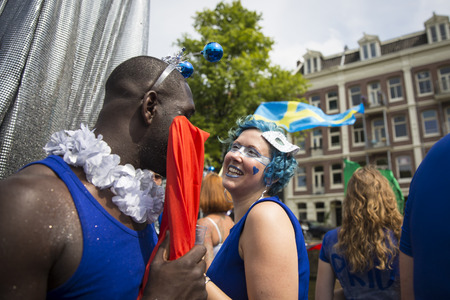 Amsterdam, Netherlands - August 1, 2015: participants in the annual event for the protection of human rights and civil equality - Gay Pride Parade on the Prinsengracht, Amsterdamのeditorial素材