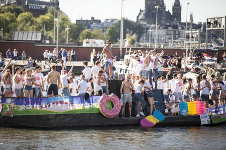 Amsterdam, the Netherlands â August 06, 2016: participants in the annual event for the protection of human rights and civil equality - Gay Pride Parade on the canals during Euro Pride 2016のeditorial素材