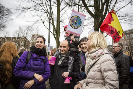 Amsterdam, The Netherlands - February 6,2016: public multi-cultural demonstration organized to protest against racism and islamophobia named "Refugees welcome, racism not!"のeditorial素材