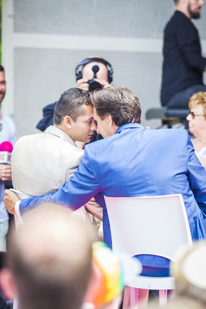 Amsterdam, the Netherlands â July 23, 2016: wedding ceremony of Lucien Spee, director from Amsterdam Gay Pride  association, and Victor at Vondelpark during Pink Saturday Gay Euro Pride celebrationsのeditorial素材