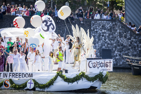 Amsterdam, the Netherlands - August 06, 2016: participants from association Coexist at annual event for protection of human rights and civil equality - Gay Pride Parade during Euro Pride 2016のeditorial素材
