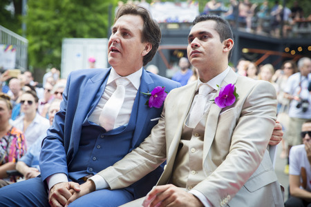 Amsterdam, the Netherlands â July 23, 2016: wedding ceremony of Lucien Spee, director from Amsterdam Gay Pride  association, and Victor at Vondelpark during Pink Saturday Gay Euro Pride celebrationsのeditorial素材