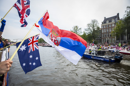 Amsterdam, Netherlands - August 1, 2015: participants in the annual event for the protection of human rights and civil equality - Gay Pride Parade on the Prinsengracht, Amsterdamのeditorial素材