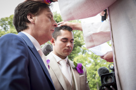 Amsterdam, the Netherlands â July 23, 2016: wedding ceremony of Lucien Spee, director from Amsterdam Gay Pride  association, and Victor at Vondelpark during Pink Saturday Gay Euro Pride celebrationsのeditorial素材