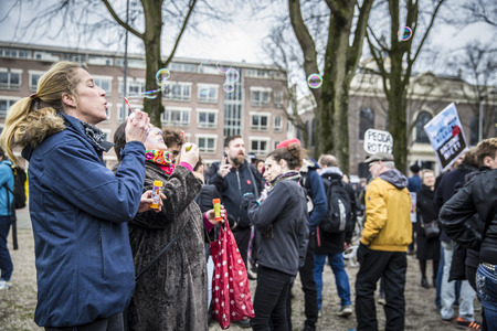 Amsterdam, The Netherlands - February 6,2016: public multi-cultural demonstration organized to protest against racism and islamophobia named "Refugees welcome, racism not!"のeditorial素材