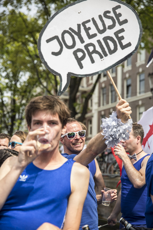 Amsterdam, Netherlands - August 1, 2015: participants in the annual event for the protection of human rights and civil equality - Gay Pride Parade on the Prinsengracht, Amsterdamのeditorial素材