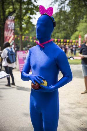 Amsterdam, the Netherlands - July 23, 2016: men wearing an integral  morphsuit in the Vondelpark for Pink Saturday 2016 Gay Euro Pride celebrationsのeditorial素材