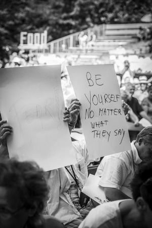 Amsterdam, the Netherlands - July 23, 2016: people writing messages about homosexuality,  Pink Saturday celebrations in Vondelpark for 2016 Gay Euro Prideのeditorial素材