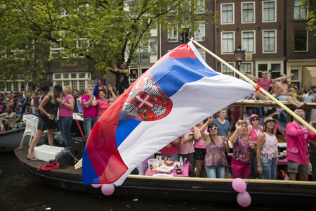 Amsterdam, Netherlands - August 1, 2015: participants in the annual event for the protection of human rights and civil equality - Gay Pride Parade on the Prinsengracht, Amsterdamのeditorial素材