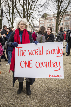 Amsterdam, The Netherlands - February 6, 2016: public multi-cultural demonstration organized to protest against racism and islamophobia named "Refugees welcome, racism not!"のeditorial素材