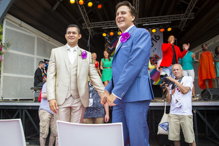 Amsterdam, the Netherlands - July 23, 2016: wedding ceremony of Lucien Spee, director from Amsterdam Gay Pride  association, and Victor at Vondelpark during Pink Saturday Gay Euro Pride celebrationsのeditorial素材