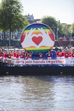 Amsterdam, the Netherlands - August 06, 2016: participants in the annual event for the protection of human rights and civil equality - Gay Pride Parade on the canals during Euro Pride 2016のeditorial素材