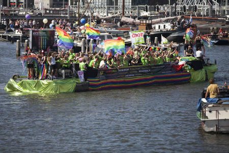 Amsterdam, the Netherlands - August 06, 2016: participants in the annual event for the protection of human rights and civil equality - Gay Pride Parade on the canals during Euro Pride 2016のeditorial素材