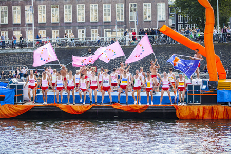 Amsterdam, the Netherlands - August 06, 2016: participants in the annual event for the protection of human rights and civil equality - Gay Pride Parade on the canals during Euro Pride 2016のeditorial素材