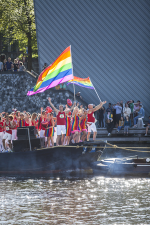 Amsterdam, the Netherlands - August 06, 2016: participants in the annual event for the protection of human rights and civil equality - Gay Pride Parade on the canals during Euro Pride 2016のeditorial素材