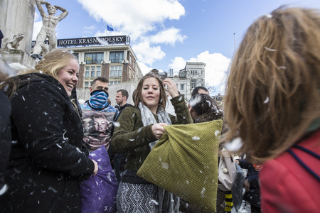 Amsterdam, The Netherlands, Noord Holland - Saturday, April 4 2015 - Pillow Fight on Dam Square as part of the international pillow fight day held in several cities in the worldのeditorial素材
