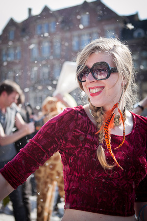 Amsterdam, The Netherlands, Noord Holland - Saturday, April 5 2014 - Pillow Fight on Dam Squareのeditorial素材