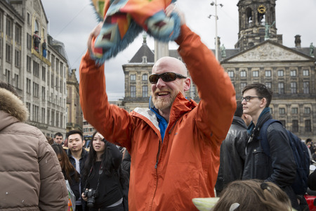 Amsterdam, The Netherlands, Noord Holland - Saturday, April 4 2015 - Pillow Fight on Dam Square as part of the international pillow fight day held in several cities in the worldのeditorial素材