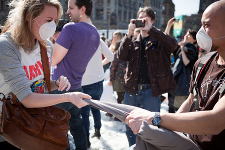 Amsterdam, The Netherlands, Noord Holland - Saturday, April 5 2014 - Pillow Fight on Dam Squareのeditorial素材