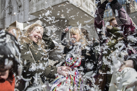 Amsterdam, The Netherlands, Noord Holland - Saturday, April 4 2015 - Pillow Fight on Dam Square as part of the international pillow fight day held in several cities in the worldのeditorial素材