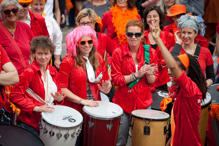 Amsterdam, The Netherlands, April 30, 2014: celebration of the public national holiday King's day - Koningsdag - held every year on 30th of April in the entire country to celebrate King Willem's birthdayのeditorial素材